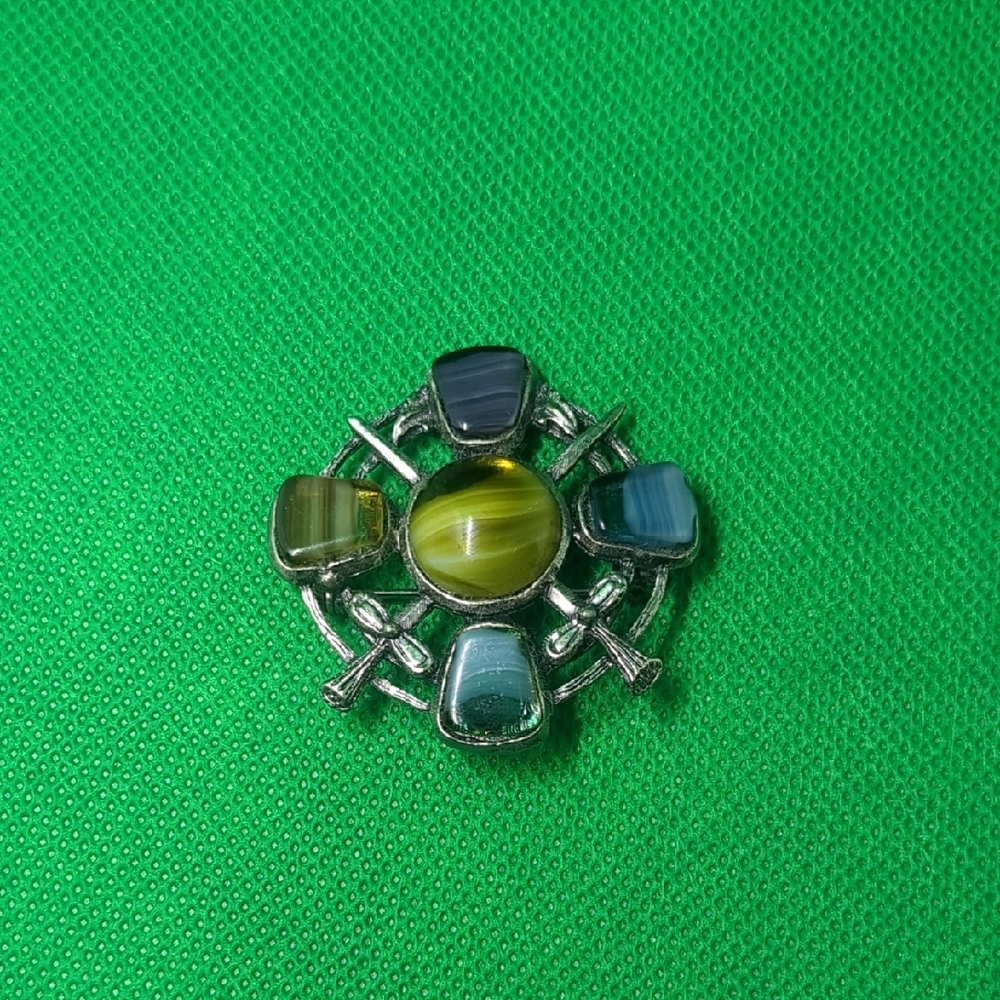 Green and Silver Celtic Brooch with Ornate Design